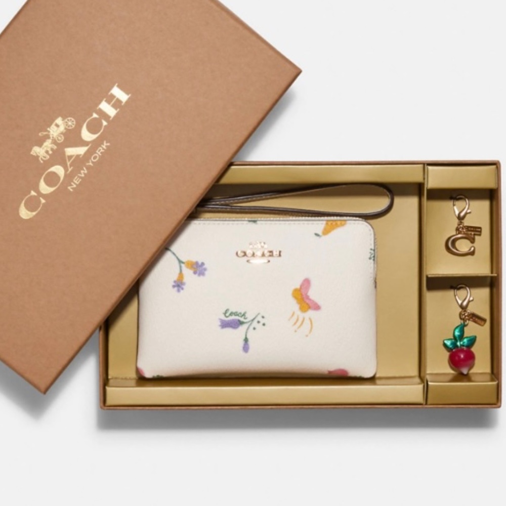NEW Coach wristlet in floral/veggie print with radish & coach "C" charm